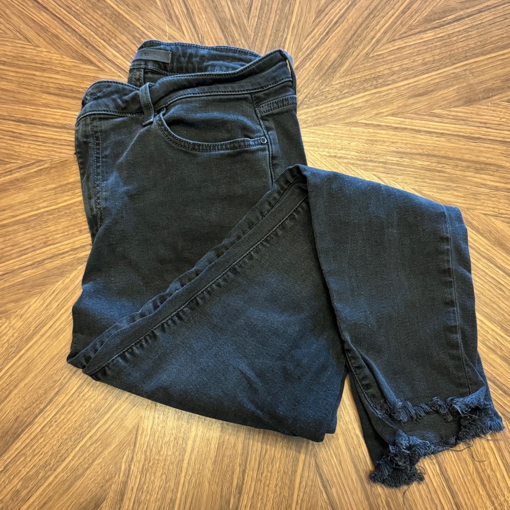 Joe’s distressed black jeans, raw hem, stretchy and skinny, size 31.